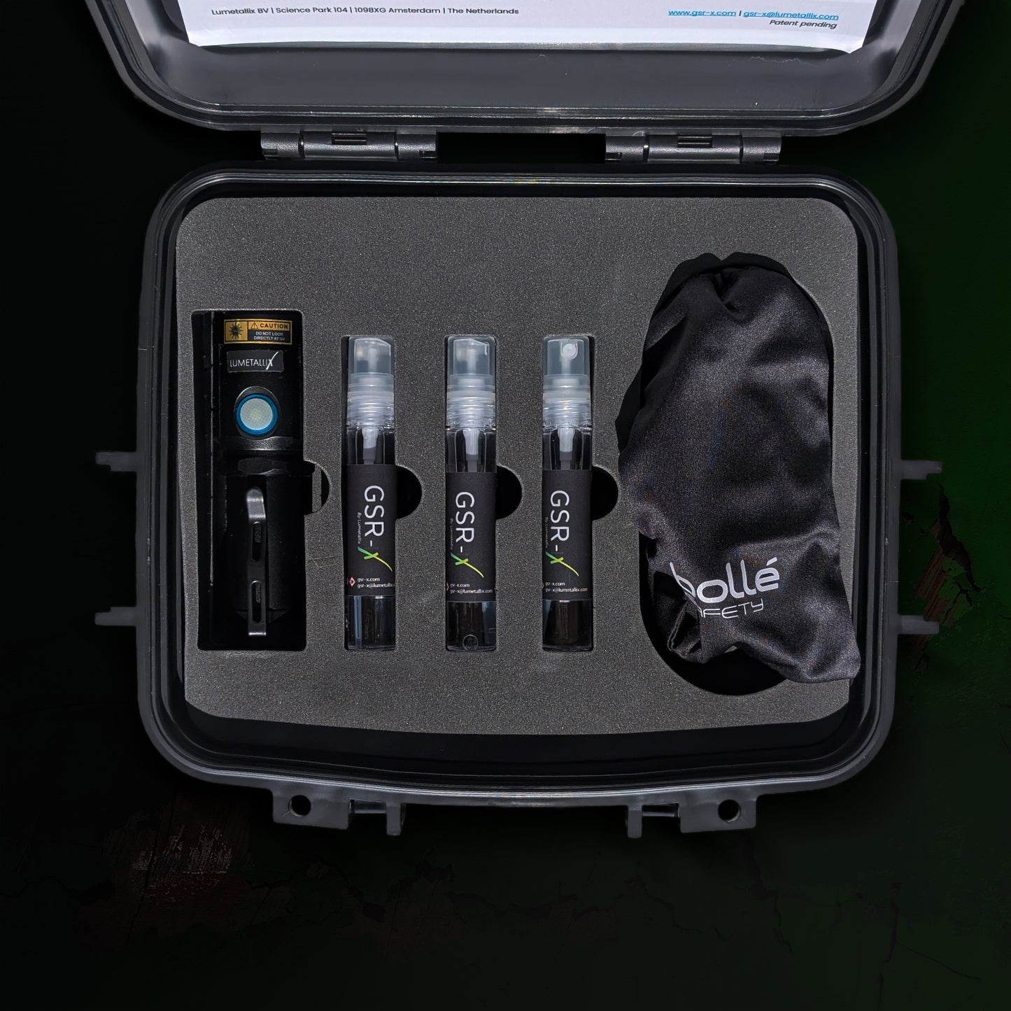 Set of GSR products in a black case with a branded cloth